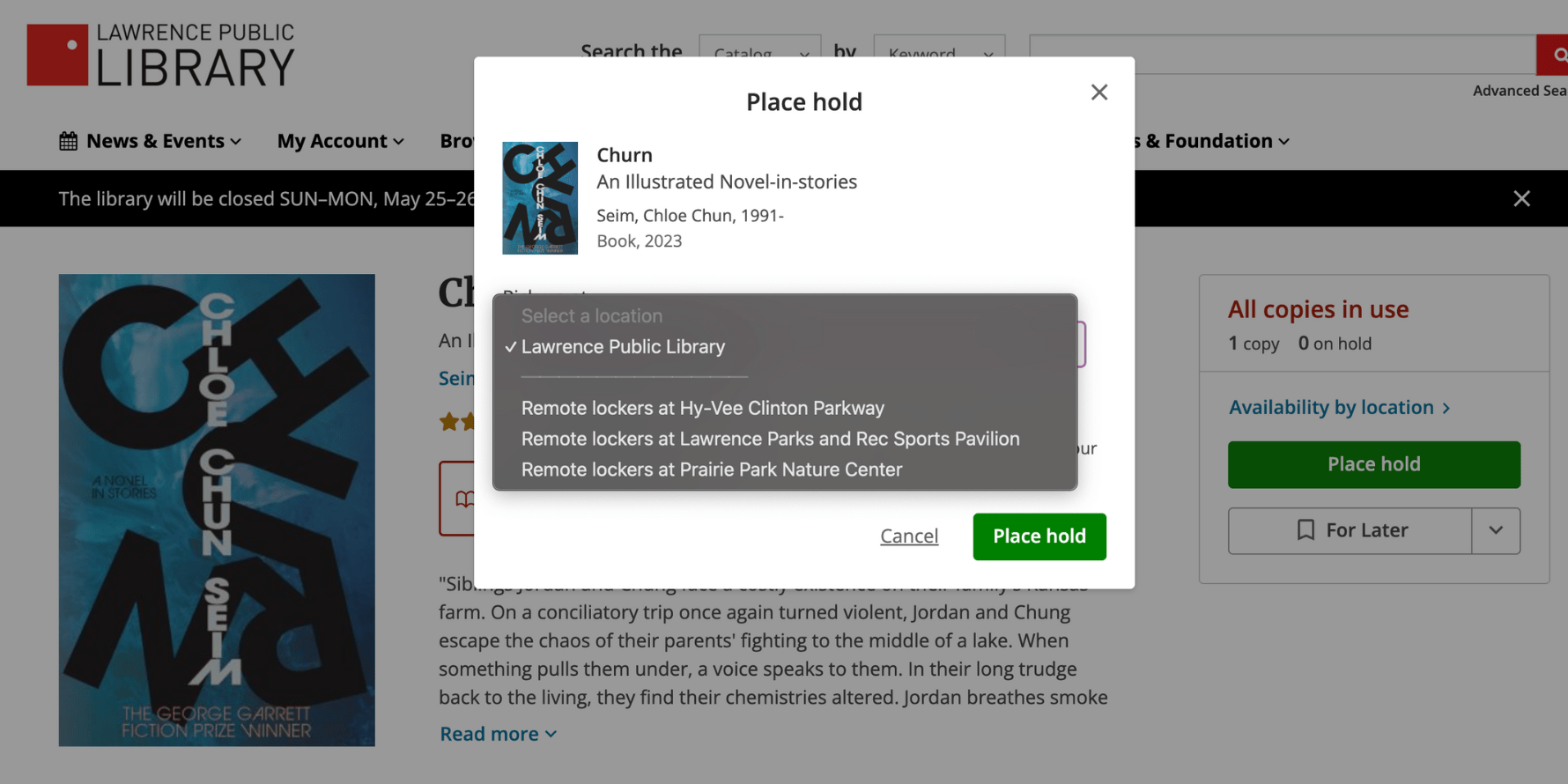 A pop-up menu asks the user to choose a hold pick-up location from a drop-down menu. The user has selected Lawrence Public Library.